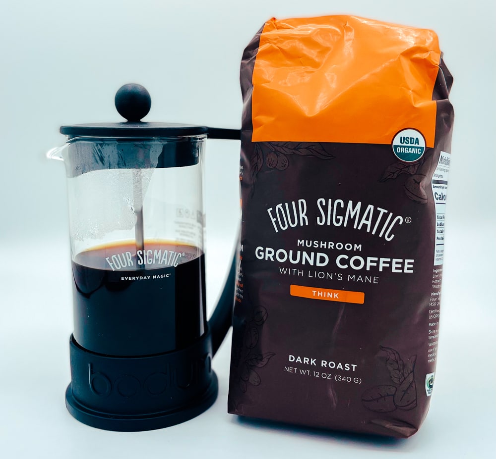 four sigmatic ground mushroom coffee and coffee press